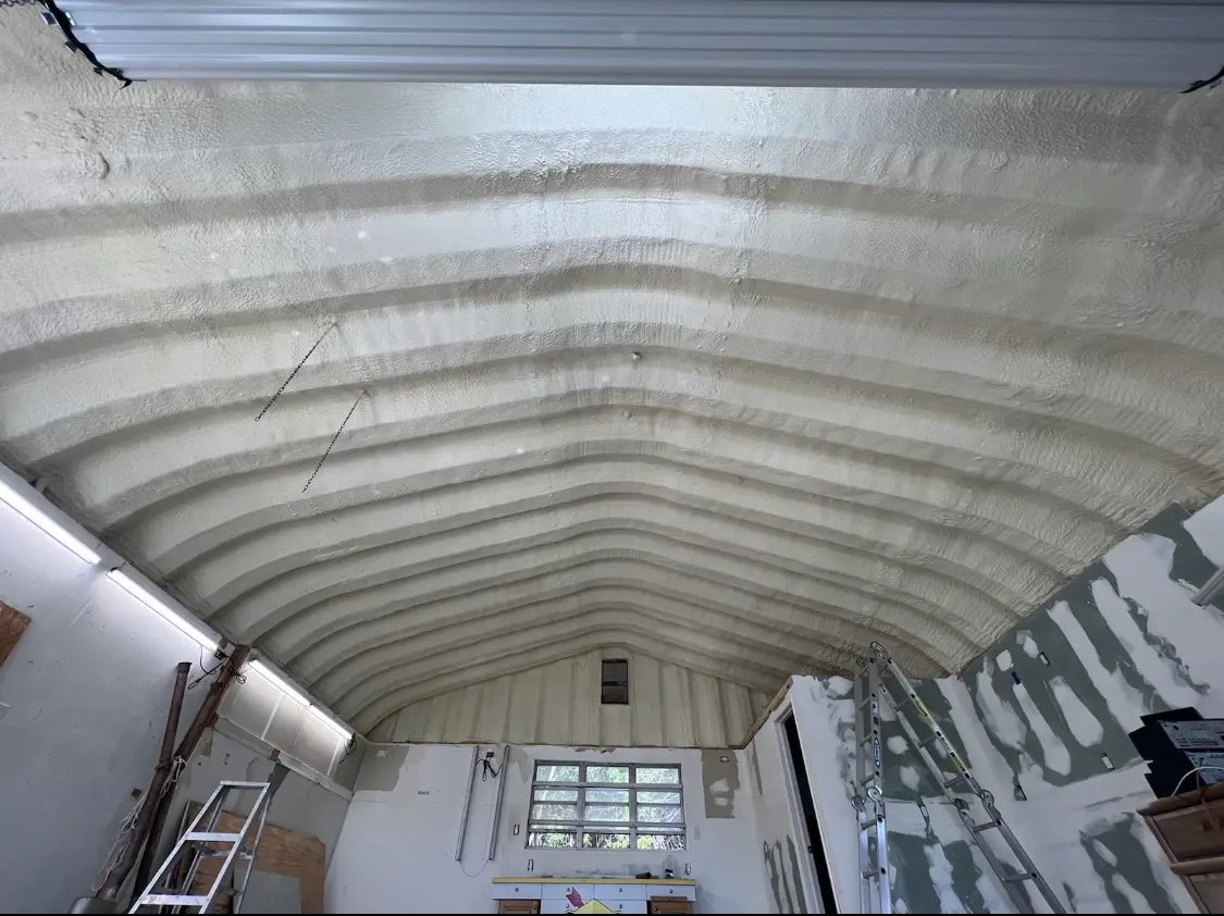 Spray polyurethane foam applied to the underside of a metal roof deck in Interlaken